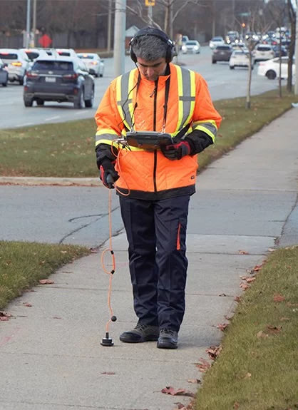 Man operating Perja Plus testing for water leakage